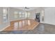 Spacious living room with plenty of natural light, fireplace, and hardwood floors at 20121 N 76Th St # 2021, Scottsdale, AZ 85255