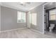 Bedroom featuring neutral walls, light flooring, and ensuite bathroom at 20576 W Briarwood Dr, Buckeye, AZ 85396