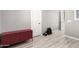 Exercise room features weights, neutral walls, light flooring, and red storage cabinet at 20576 W Briarwood Dr, Buckeye, AZ 85396