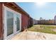 Exterior view of a backyard with patio and partially fenced-in grass area at 2110 W Morrow Dr, Phoenix, AZ 85027