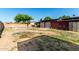 View of backyard featuring a potential pool and block fence at 2110 W Morrow Dr, Phoenix, AZ 85027