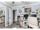 Bedroom features gray wood flooring, doorway, and desk space at 2110 W Morrow Dr, Phoenix, AZ 85027