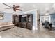 Living room area next to the dining room, wood-look floors at 2110 W Morrow Dr, Phoenix, AZ 85027