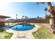 Enjoy the Arizona sun in this beautiful pool, set in a lush backyard, perfect for relaxation and entertainment at 2110 W Morrow Dr, Phoenix, AZ 85027