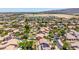 Scenic aerial view of a desert community featuring Gathering-friendly amenities, private pools, and mature landscaping at 2116 W Fawn Dr, Phoenix, AZ 85041