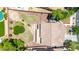 Aerial view of backyard featuring a heart-shaped lawn design, desert landscaping, and view of roof at 2116 W Fawn Dr, Phoenix, AZ 85041