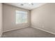 Neutral bedroom with carpet and ceiling fan provides a calm and comfortable space at 2116 W Fawn Dr, Phoenix, AZ 85041