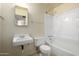 Bathroom featuring a sink, toilet, and bathtub at 230 E Fairmont Dr, Tempe, AZ 85282