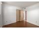 A well-lit bedroom with wood-look flooring at 230 E Fairmont Dr, Tempe, AZ 85282