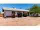 Modest single-story home with bright red bougainvillea bushes lining the front at 230 E Fairmont Dr, Tempe, AZ 85282