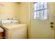 Laundry room with a classic washing machine at 230 E Fairmont Dr, Tempe, AZ 85282