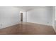 Bright living room with neutral walls and tile flooring creating a clean and airy space at 230 E Fairmont Dr, Tempe, AZ 85282