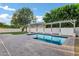 Backyard with a rectangular pool and pergola-covered patio perfect for outdoor entertaining at 2774 E Valencia St, Gilbert, AZ 85296