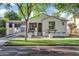 Charming single-Gathering home with a landscaped front yard and a quaint covered parking area at 2774 E Valencia St, Gilbert, AZ 85296