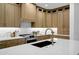 Modern kitchen with stainless steel appliances, quartz countertops, and custom cabinetry at 2774 E Valencia St, Gilbert, AZ 85296