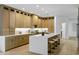 Spacious kitchen features a large island with seating and abundant cabinet space at 2774 E Valencia St, Gilbert, AZ 85296