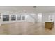 Spacious open floor plan with light wood floors and bright window lighting at 2774 E Valencia St, Gilbert, AZ 85296