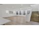 Spacious open floor plan with light wood floors and bright window lighting at 2774 E Valencia St, Gilbert, AZ 85296