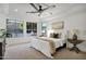 Bright main bedroom with large windows and neutral décor at 2774 E Valencia St, Gilbert, AZ 85296