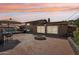 Outdoor living space features a brick patio, fire pit and string lights for evening enjoyment at 2847 S Bala Dr, Tempe, AZ 85282