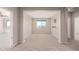 A versatile bonus room with neutral walls, carpet, and a view of the outdoors at 2920 E Virginia E St, Mesa, AZ 85213
