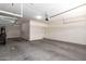 Spacious two car garage with a visible garage door opener and concrete floor at 2920 E Virginia E St, Mesa, AZ 85213