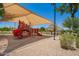 Fun playground with slides and covered seating, providing a great space for and families to enjoy at 2920 E Virginia E St, Mesa, AZ 85213
