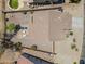 Expansive backyard with pool, patio, gravel landscaping, and outdoor seating; a perfect oasis for relaxation and entertaining at 29368 N Red Finch Dr, San Tan Valley, AZ 85143