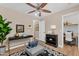 This bedroom offers beautiful decor, light hardwood floors, and bright lighting at 29368 N Red Finch Dr, San Tan Valley, AZ 85143