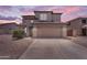 Attractive two-story home with a well-manicured yard and a two-car garage, perfect for Gathering living at 29368 N Red Finch Dr, San Tan Valley, AZ 85143