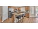 Beautiful kitchen featuring stainless steel appliances and a granite island with seating at 29368 N Red Finch Dr, San Tan Valley, AZ 85143