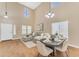 Open floor plan living room and dining area with abundant natural light at 29368 N Red Finch Dr, San Tan Valley, AZ 85143