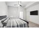 Comfortable bedroom featuring plank flooring, neutral walls, and natural light at 295 N Rural Rd # 133, Chandler, AZ 85226