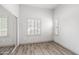 Bright bedroom with a closet and plank flooring at 295 N Rural Rd # 133, Chandler, AZ 85226