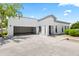 Bright single-story home with a large two car garage and well maintained front yard at 295 N Rural Rd # 133, Chandler, AZ 85226
