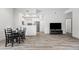 Open-concept living space with dining area leading to a modern kitchen at 295 N Rural Rd # 133, Chandler, AZ 85226