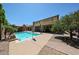 Beautiful backyard with pool, patio, seating, and lush landscaping at 3088 E Andre Ave, Gilbert, AZ 85298