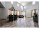Spacious dining area with high ceilings and a decorative chandelier, perfect for hosting elegant dinners at 3088 E Andre Ave, Gilbert, AZ 85298