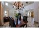 Elegant dining room featuring a classic chandelier and comfortable seating, perfect for Gathering gatherings at 3088 E Andre Ave, Gilbert, AZ 85298