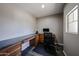 Home office boasts a built-in desk, drawers and a bright window at 3088 E Andre Ave, Gilbert, AZ 85298