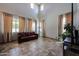 Bright living room with large windows, offering plenty of natural light and a relaxing atmosphere at 3088 E Andre Ave, Gilbert, AZ 85298