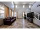 Bright living room featuring high ceilings, large windows, and comfortable seating, perfect for relaxation at 3088 E Andre Ave, Gilbert, AZ 85298
