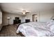 Large main bedroom featuring wood floors, ceiling fan, and lots of sunlight at 3088 E Andre Ave, Gilbert, AZ 85298