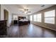 Spacious main bedroom boasts wood floors, ceiling fan, and plenty of natural light at 3088 E Andre Ave, Gilbert, AZ 85298