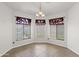 Well-lit dining area with tiled floors and a decorative chandelier at 3114 E Kristal Way, Phoenix, AZ 85050