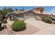 Well-maintained home with desert landscaping and a two-car garage at 3114 E Kristal Way, Phoenix, AZ 85050