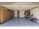 Spacious garage with built in storage cabinets, utility sink and door to the house at 3114 E Kristal Way, Phoenix, AZ 85050