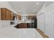 Bright kitchen features white countertops, stainless appliances, and wood cabinetry at 3114 E Kristal Way, Phoenix, AZ 85050