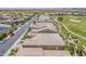Aerial view of property and surrounding community, highlighting roof lines and mature landscaping at 36172 N Secret Garden Path, Queen Creek, AZ 85140