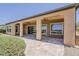 Spacious back porch featuring a tiled floor, ceiling fans, and a beautiful outdoor view at 36172 N Secret Garden Path, Queen Creek, AZ 85140